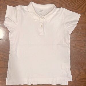 Lands’End White Polo. 100% cotton very soft. Size (10-12)M
